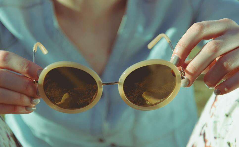 Wearing sunglasses at summer writing conferences with funding