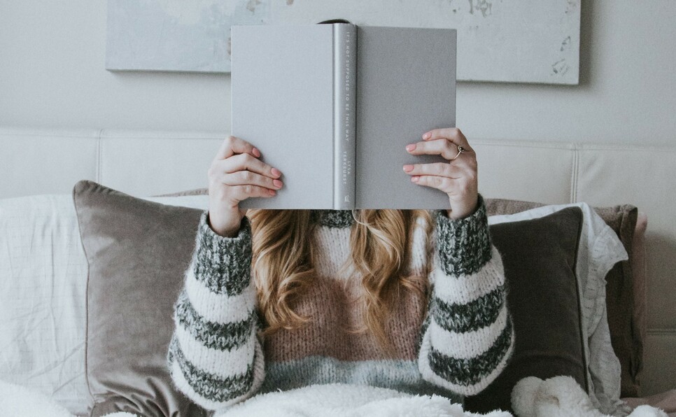 Woman reading plot twist books