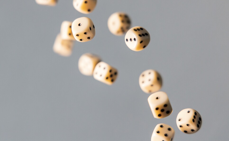 Dice being thrown to show the odds of getting published