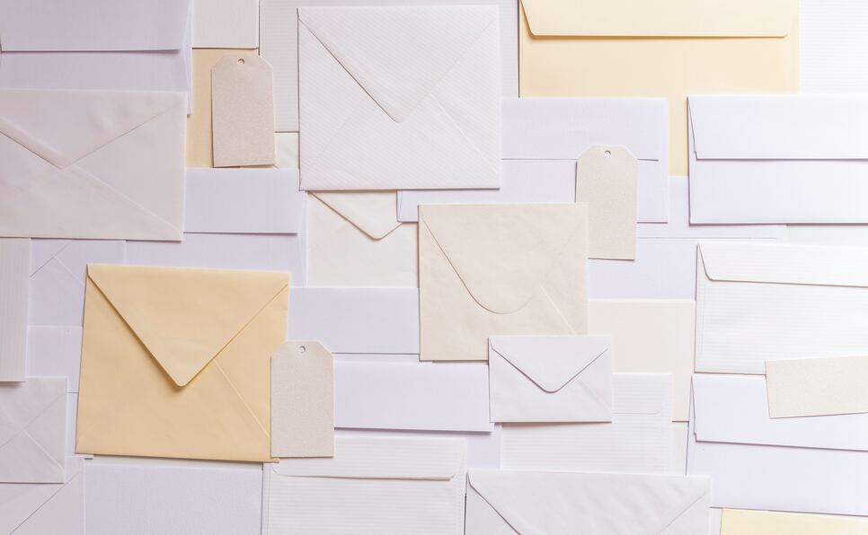 Different envelopes showing query letters for different genres
